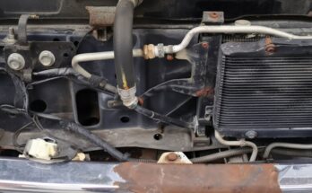 Front bumper removal on a 1988–1998 Chevy GMC C/K 1500 OBS truck, showing bolts, brackets, tools, and safe step-by-step bumper removal techniques.