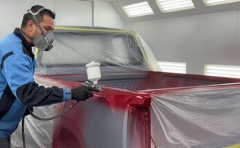 Professional red pearl automotive paint job process with basecoat and pearl layering for high-gloss car finish.
